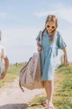 PlayandGo_outdoor_beachbag_magical_days_child_is_carrying_the_closed_bag_on_its_shoulder.jpg